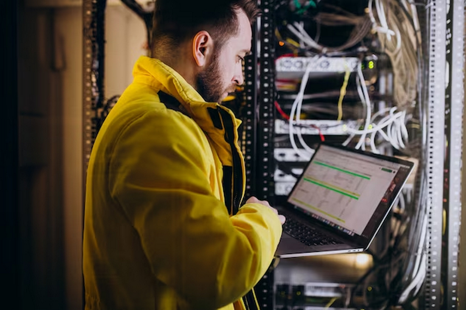 Man working on a server.